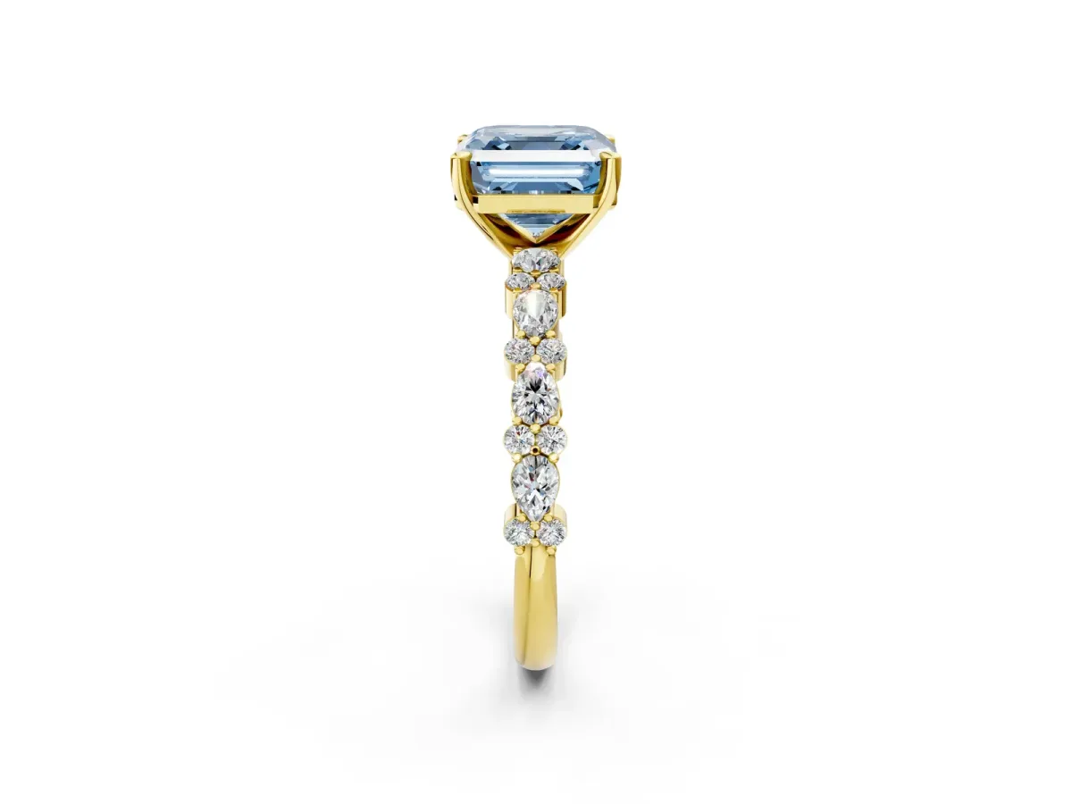 Fancy Blue Asscher Cut Diamond Side Stone Solitaire Ring with Round and Four-Prong Setting Yellow gold