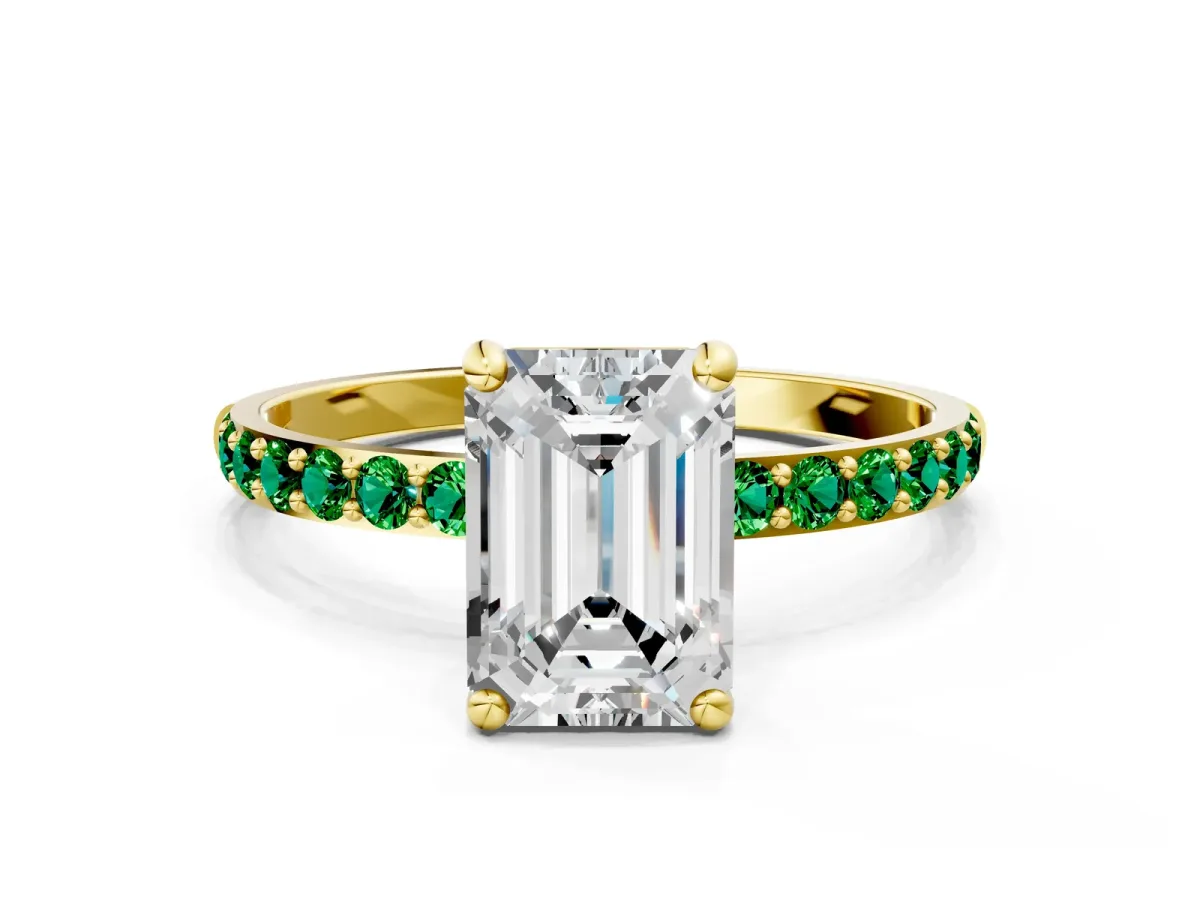Emerald Cut Diamond Solitaire Ring with Round Emerald Pavé Band and Prong Setting Yellow gold
