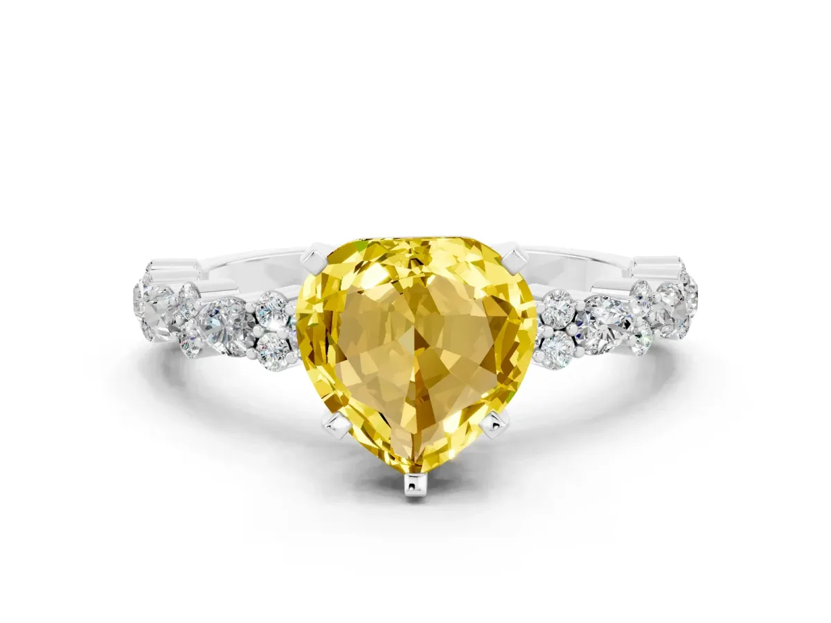 Heart Cut Yellow Sapphire Side Stone Solitaire Ring with Round and Four-Prong Setting Silver