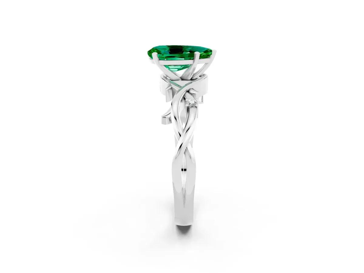Pear Cut Emerald Solitaire Ring with Twisted Band and Prong Setting Silver