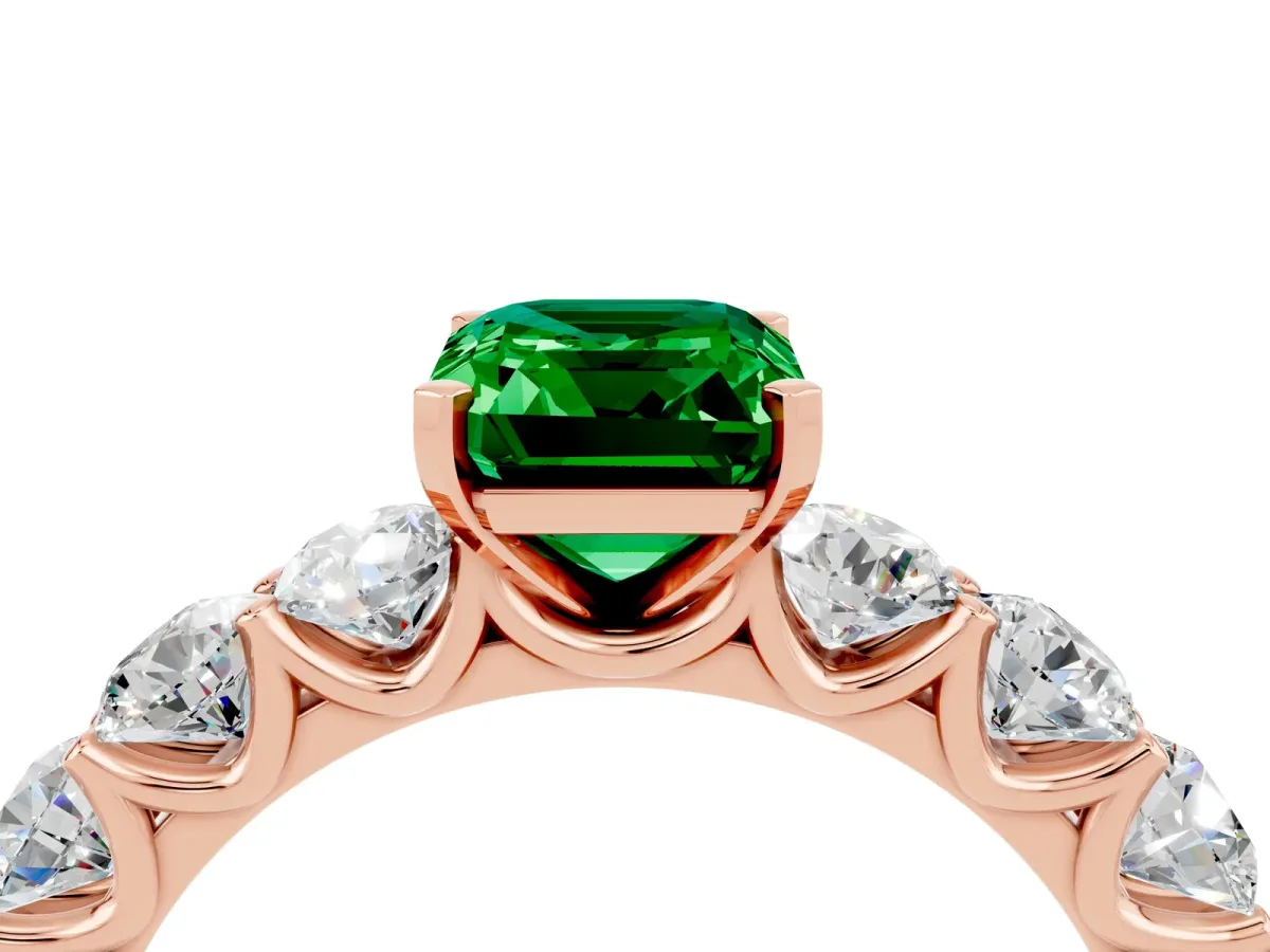 Emerald Cut Emerald Prong Setting with Side Stones on a Pave Band Rose gold