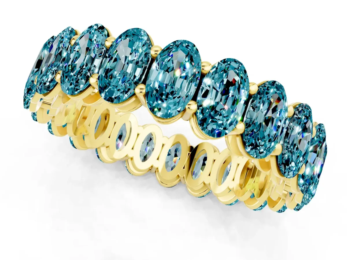 Oval Cut Blue Topaz Eternity Band with Shared Prong Setting Yellow gold