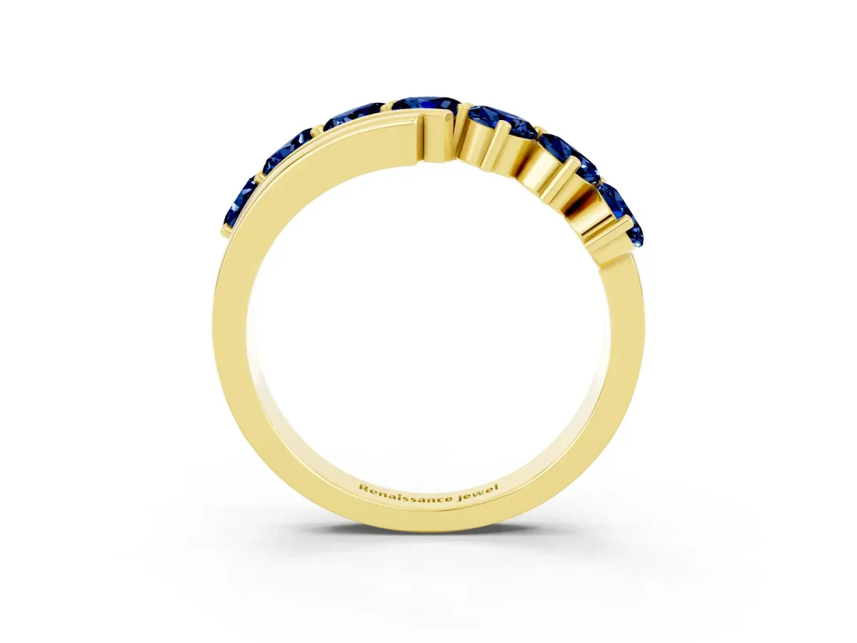 Round Blue Sapphire Wave Band with Channel and Shared Prong Setting Yellow gold