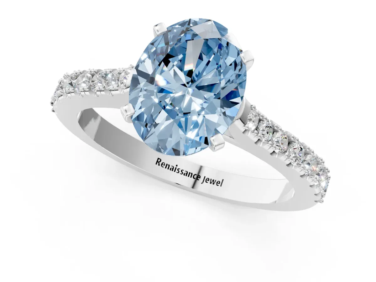 Fancy Blue Oval Cut Cut Solitaire Diamond Engagement Ring with Pave Band and Four-Prong Setting Silver
