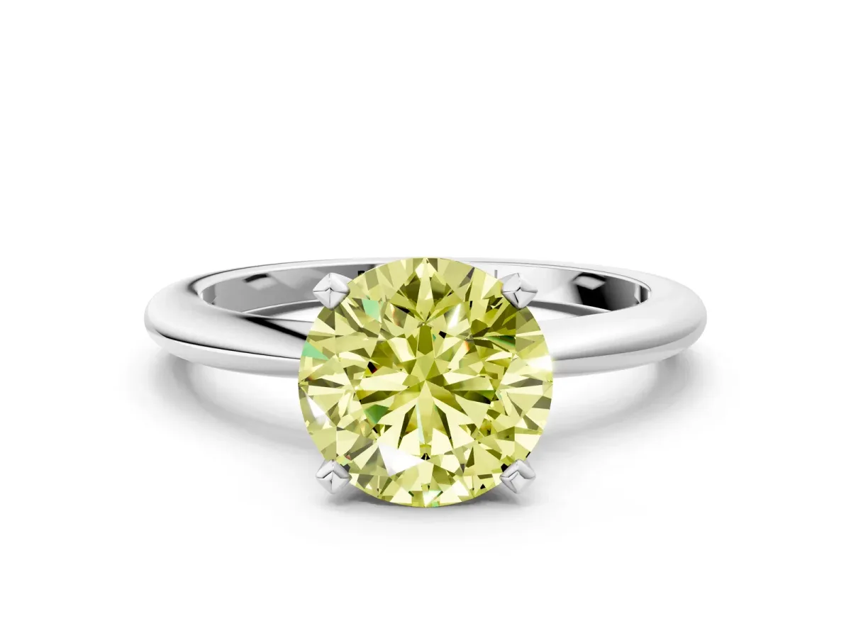 Fancy Yellow Round Cut Diamond Solitaire Ring with Six-Prong Setting and Classic Band Silver