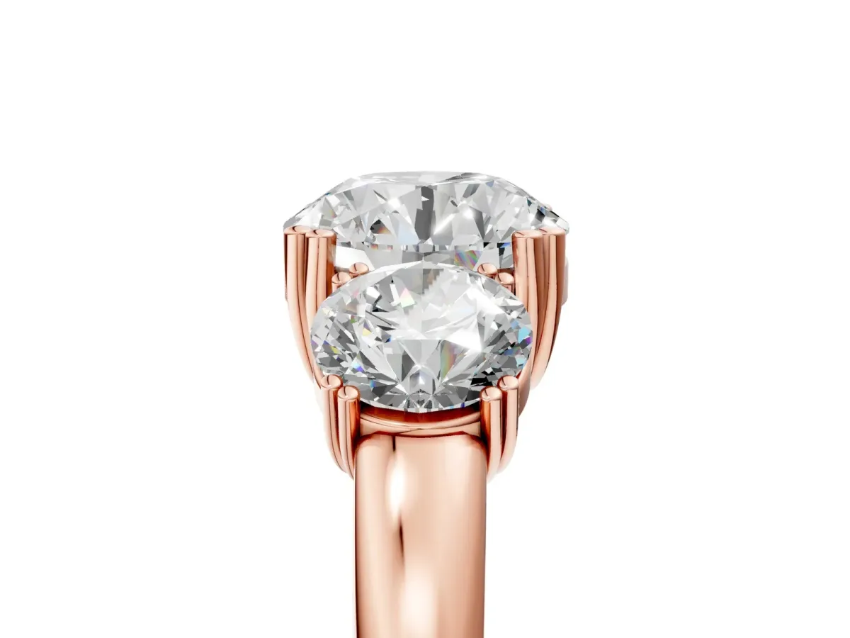 Three-Stone Round Cut Cut Diamond Ring with Channel Set Band and Four-Prong Setting Rose gold