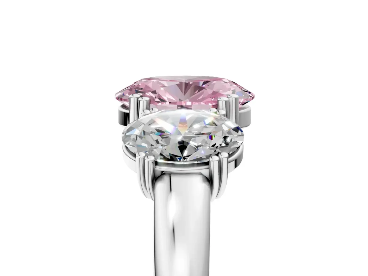 Fancy Pink Three-Stone Oval Cut Cut Diamond Ring with Channel Set Band and Four-Prong Setting Silver