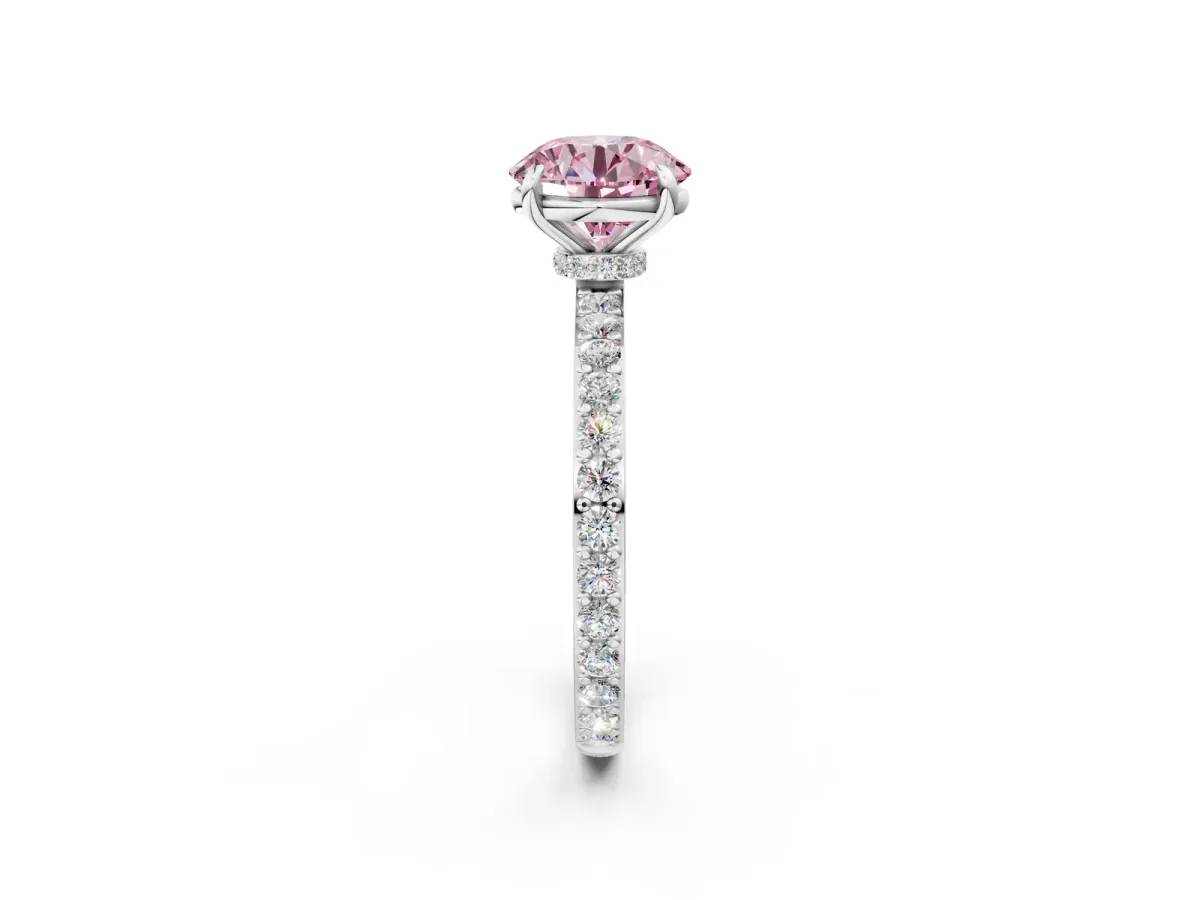 Fancy Pink Round Cut Diamond Solitaire Engagement Ring with Pavé Band and Four-Prong Setting Silver