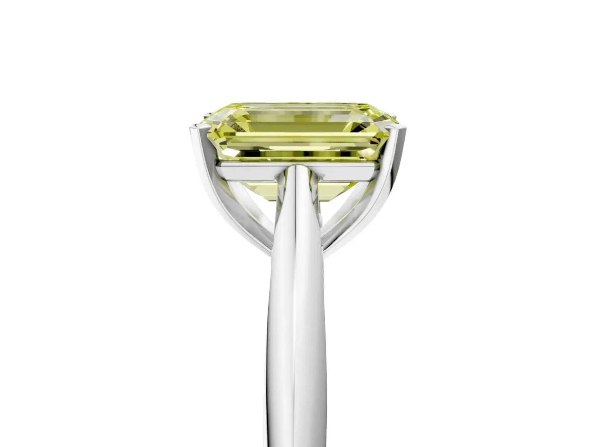 Fancy Yellow Emerald Cut Diamond Solitaire Engagement Ring with Cathedral Setting and Four-Prong Mount White gold
