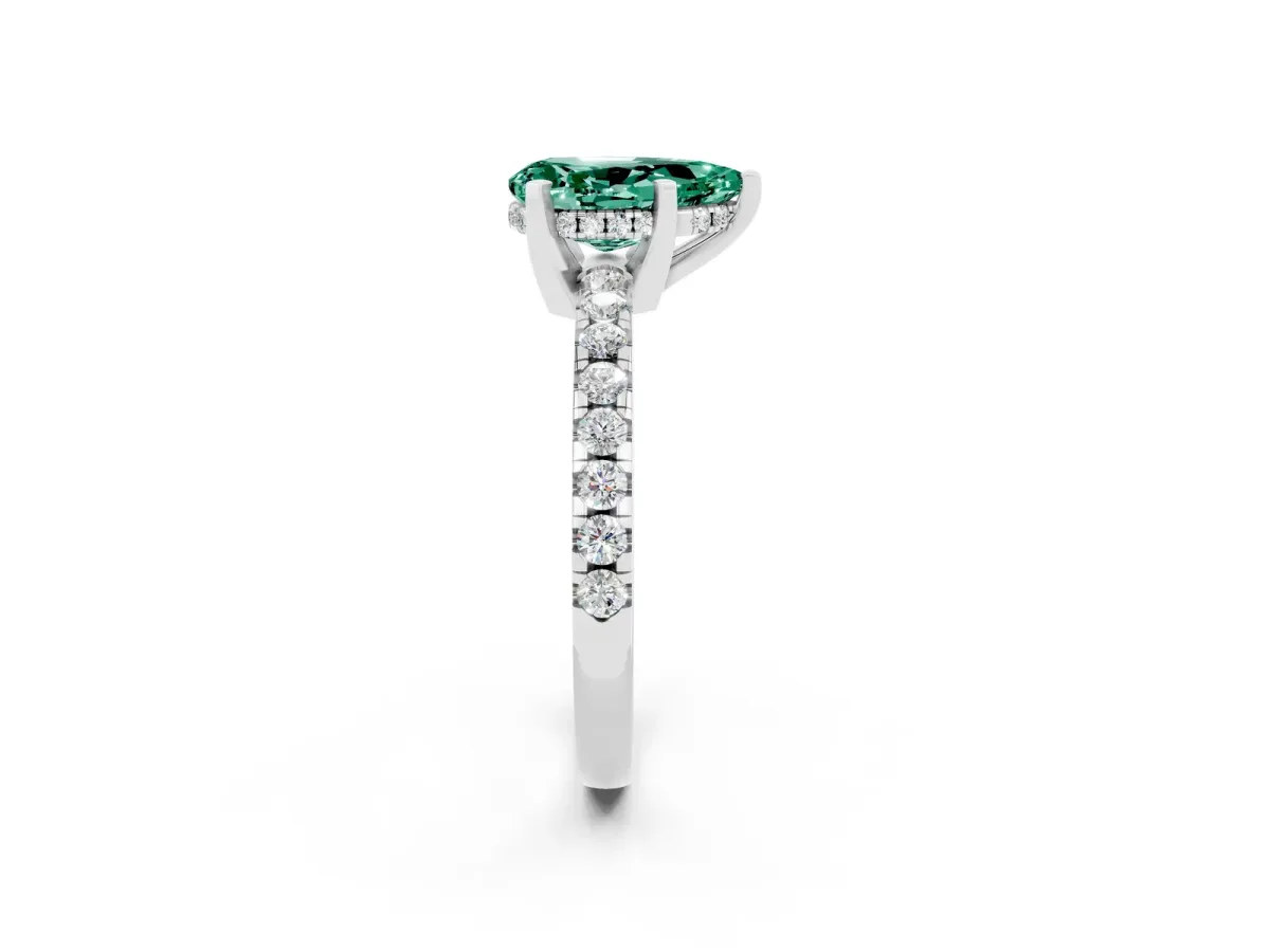Pear Cut Green Sapphire Solitaire Ring with Round Pavé Band and Four-Prong Setting Silver