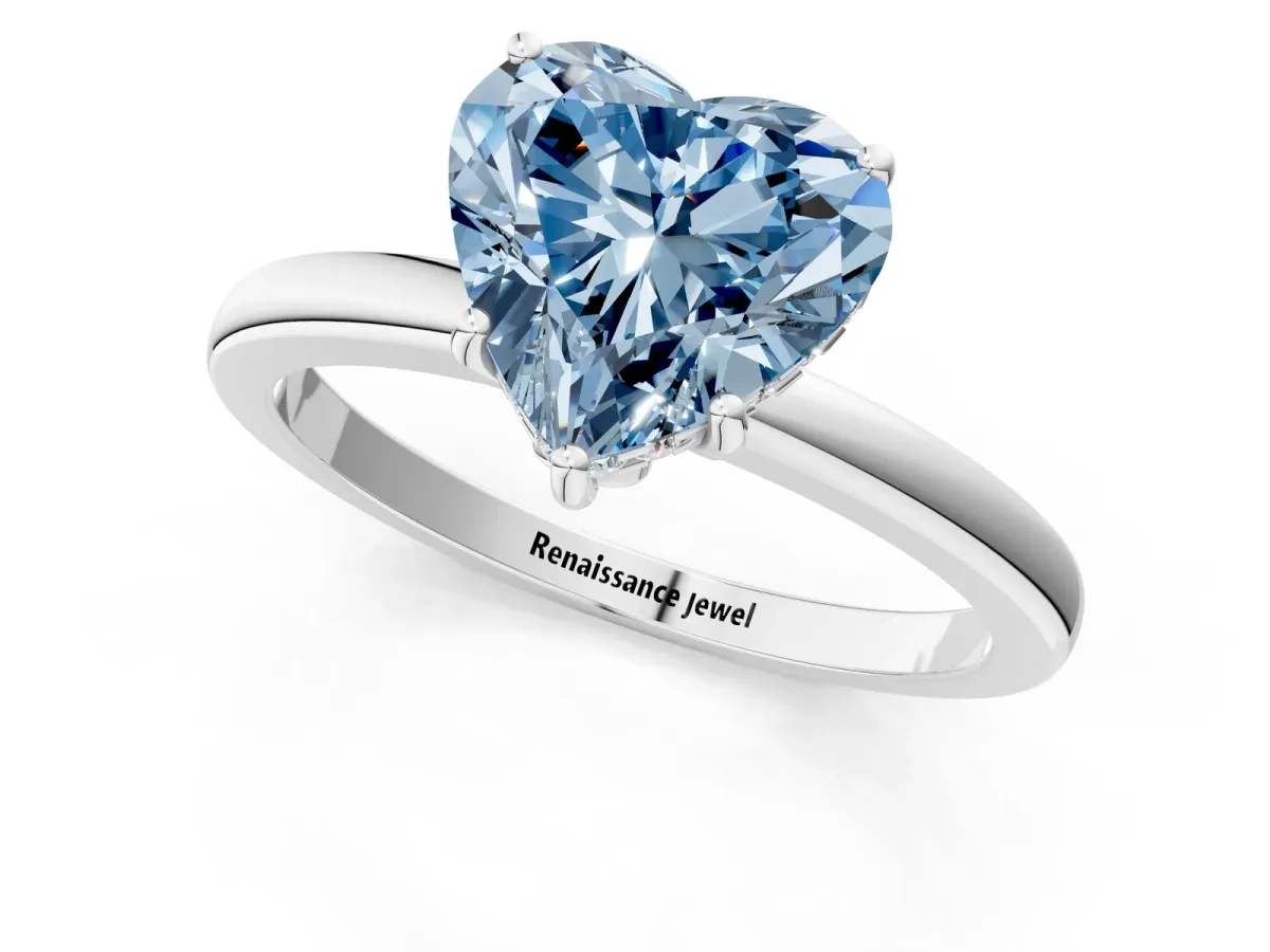 Fancy Blue Heart Cut Solitaire Diamond Ring with Prong Setting and Plain Band Silver