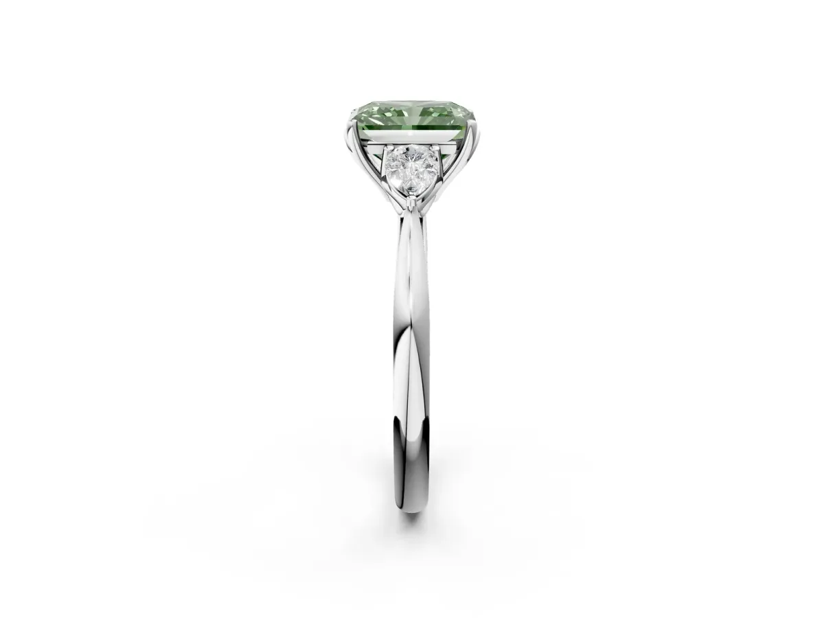 Fancy Green Three-Stone Radiant Cut Diamond Ring with Pear Side Stones in Four-Prong Setting Platinum