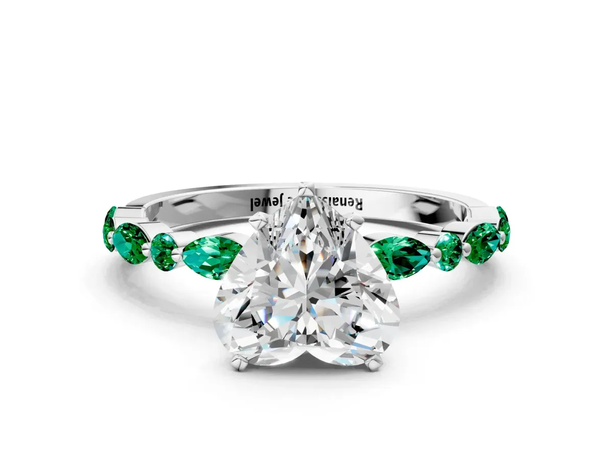 Heart Cut Diamond Ring with Marquise and Round Emerald Side Stones and Four-Prong Setting Silver