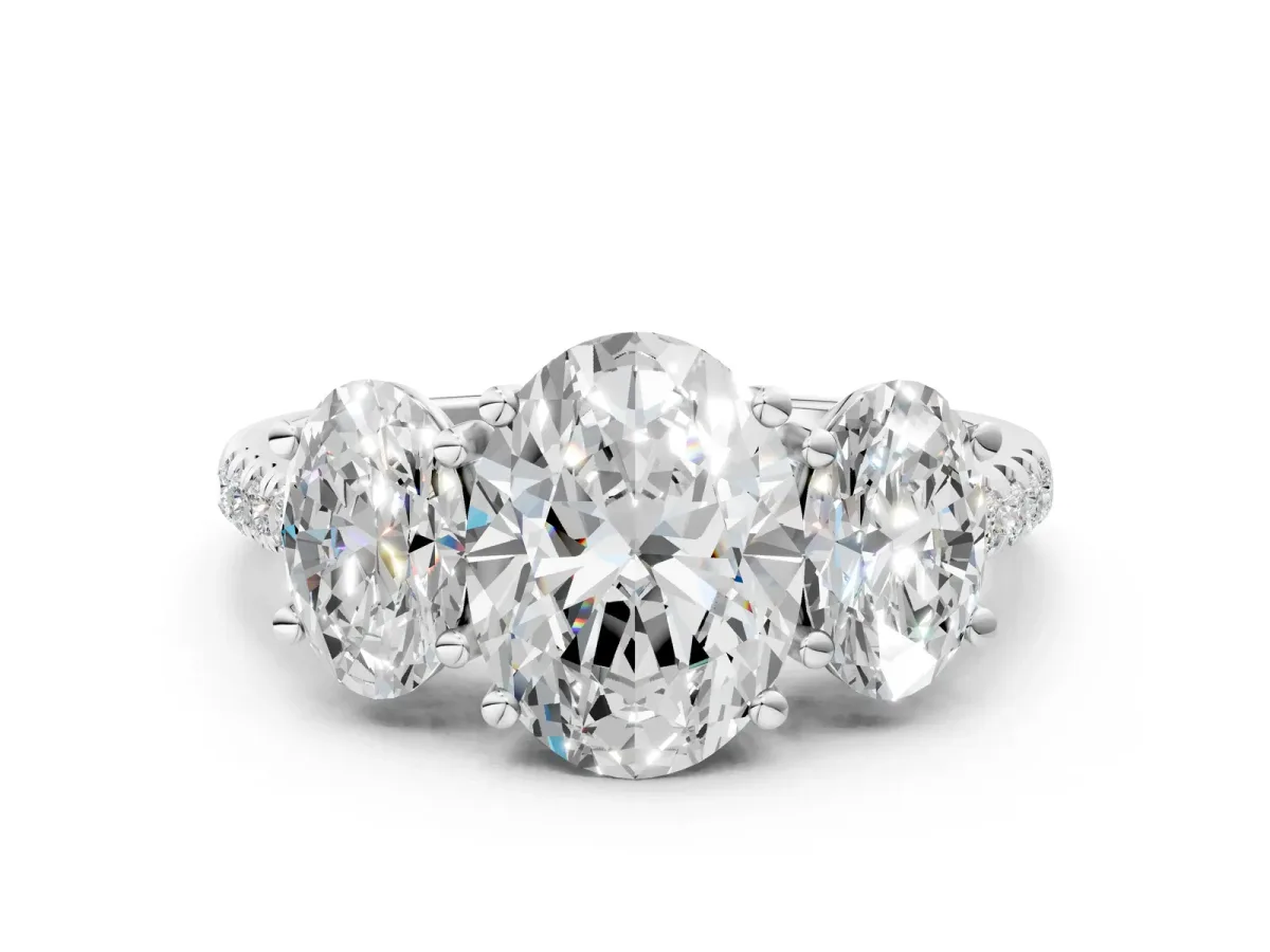 Three-Stone Oval Cut Diamond Ring with Round Moissanite Pavé Band and Prong Setting Silver