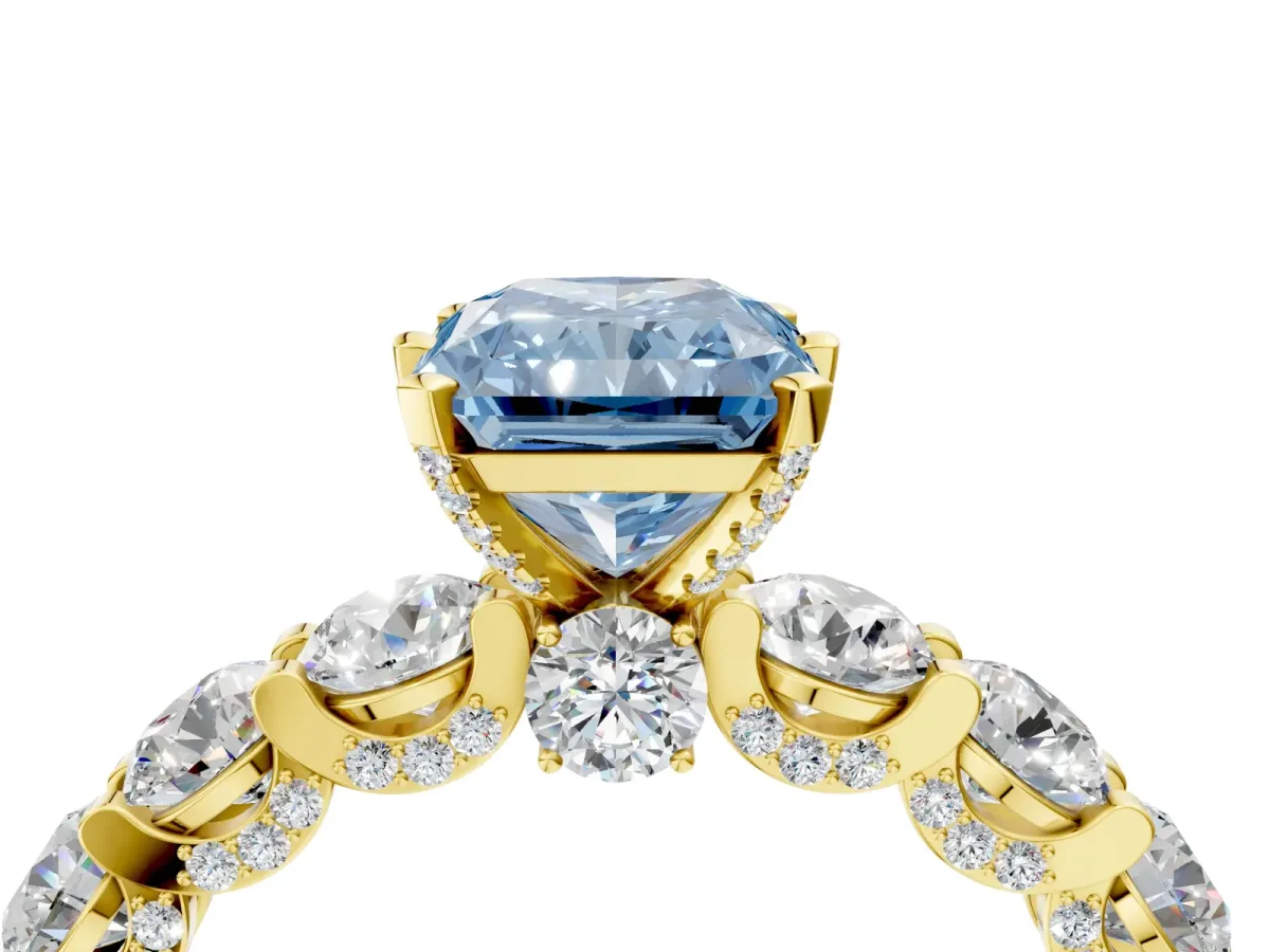 Fancy Blue Radiant Cut Diamond Side Stone Engagement Ring with Four-Prong Setting Yellow gold