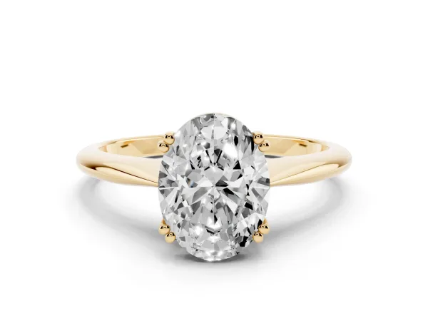 Oval Cut Solitaire Diamond Ring with Four-Prong Setting on a Tapered Band Yellow gold