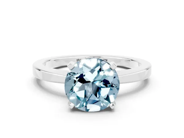 Round Cut Aquamarine Solitaire Engagement Ring with Classic Band and Four-Prong Setting Platinum