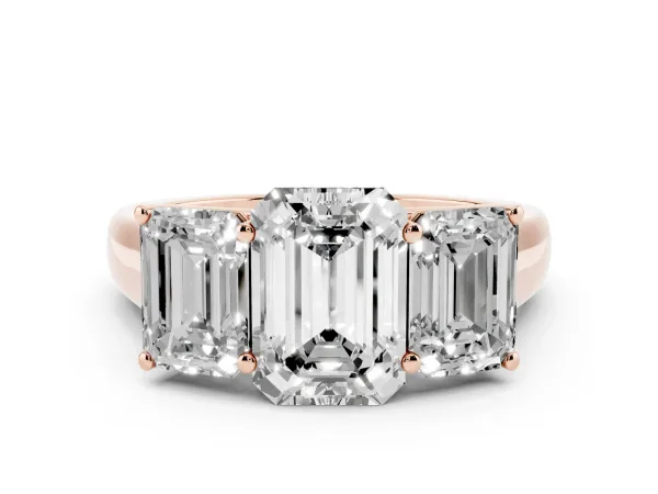 Emerald Cut Three-Stone Diamond Ring with Prong Setting on a Classic Band Rose gold