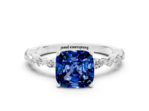 Cushion Cut Blue Sapphire Ring with Marquise and Round Side Stones and Four-Prong Setting White gold