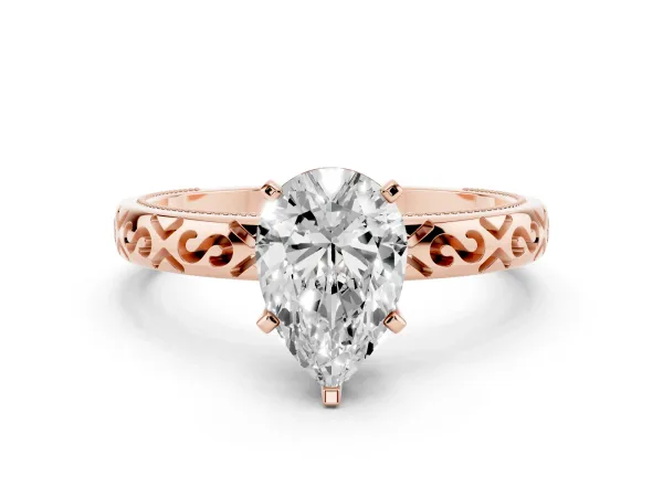 Pear Cut Solitaire Engagement Ring with Scrollwork Band and Four-Prong Setting Rose gold