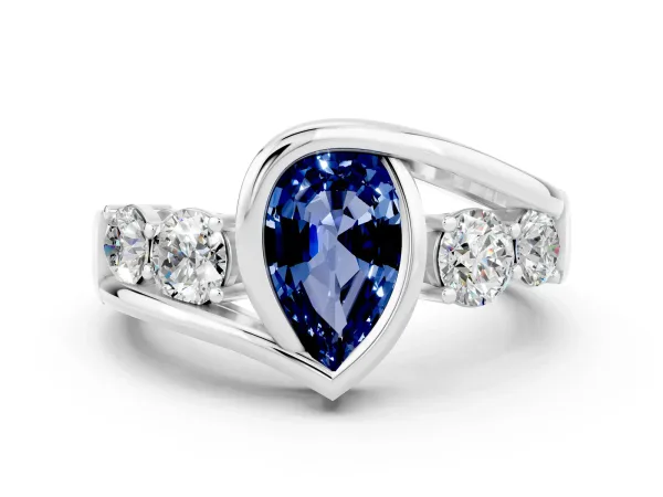 Bezel Set Pear Cut Blue Sapphire Bypass Ring with Round Accents Platinum