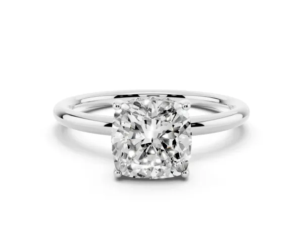 Cushion Cut Solitaire Diamond Ring with a Classic Band and Four-Prong Setting White gold