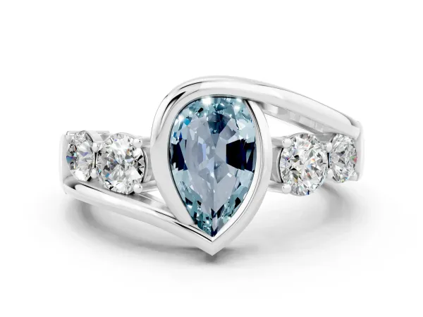 Bezel Set Pear Cut Aquamarine Bypass Ring with Round Accents Platinum