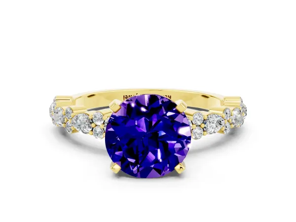Round Cut Tanzanite Side Stone Solitaire Ring with Round and Four-Prong Setting Yellow gold