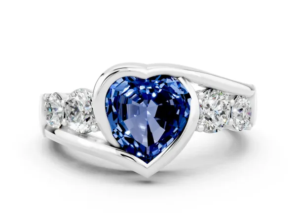 Bezel Set Heart Cut Blue Sapphire Bypass Ring with Round Accents Platinum