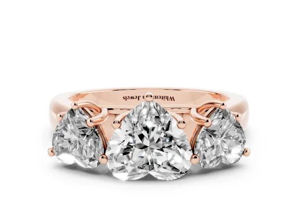 Heart Cut Three-Stone Diamond Ring with Prong Setting on a Classic Band Rose gold