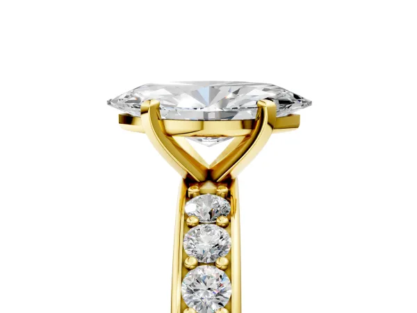 Marquise Cut Diamond Engagement Ring with Channel Set Round Band and Prong Setting Yellow gold