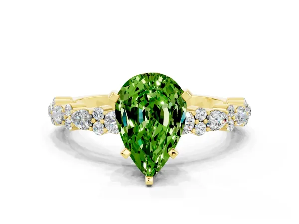 Pear Cut Peridot Side Stone Solitaire Ring with Round and Four-Prong Setting Yellow gold