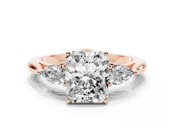Three-Stone Radiant Cut Diamond Ring with Pear Side Stones in Four-Prong Setting Rose gold