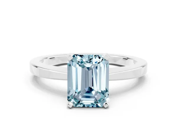 Emerald Cut Aquamarine Solitaire Engagement Ring with Classic Band and Four-Prong Setting Silver