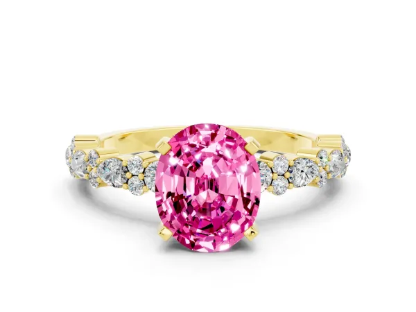 Oval Cut Pink Sapphire Side Stone Solitaire Ring with Round and Four-Prong Setting Yellow gold
