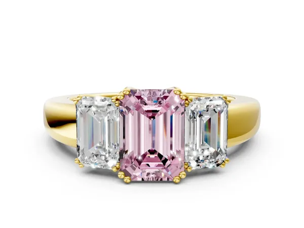 Fancy Pink Three-Stone Emerald Cut Cut Diamond Ring with Channel Set Band and Four-Prong Setting Yellow gold