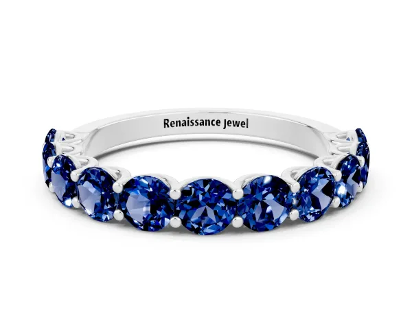 Round Blue Sapphire Shared Prong Eternity Band Platinum