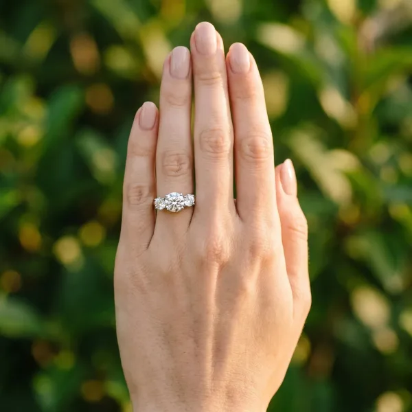 Three-Stone Asscher Cut Cut Diamond Engagement Ring with Prong Setting on a White Gold Band Silver