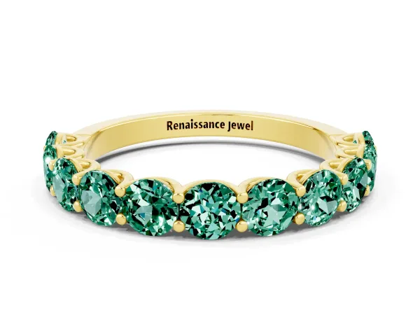 Round Green Sapphire Shared Prong Eternity Band Yellow gold