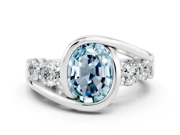 Bezel Set Oval Cut Aquamarine Bypass Ring with Round Accents Platinum