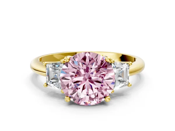 Fancy Pink Round Cut Diamond Three-Stone Ring with Trapezoid Side Stones and Prong Setting Yellow gold