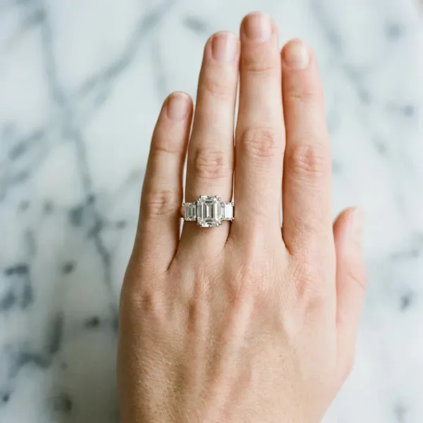 Three-Stone Asscher Cut Cut Diamond Ring with Channel Set Band and Four-Prong Setting Platinum