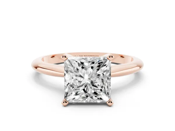 Princess Cut Cut Solitaire Ring with Four-Prong Setting on a Classic Band Rose gold