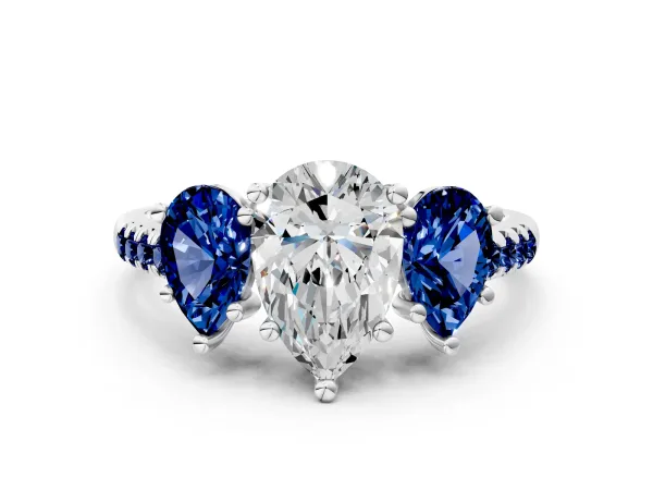 Three-Stone Pear Cut Diamond Ring with Round Blue Sapphire Pavé Band and Prong Setting White gold