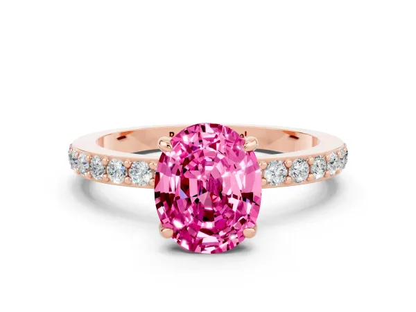 Oval Cut Pink Sapphire Solitaire Engagement Ring with Pavé Band and Four-Prong Setting Rose gold