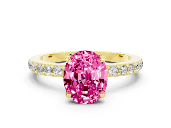Oval Cut Pink Sapphire Solitaire Engagement Ring with Pavé Band and Four-Prong Setting Yellow gold