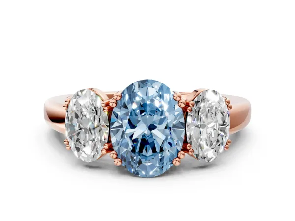 Fancy Blue Three-Stone Oval Cut Cut Diamond Ring with Channel Set Band and Four-Prong Setting Rose gold