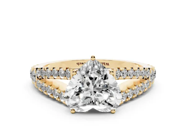 Heart Cut Diamond Split Shank Engagement Ring with Round Pavé and Prong Setting Yellow gold