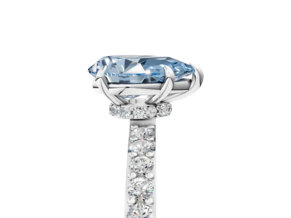 Fancy Blue Pear Cut Diamond Solitaire Engagement Ring with Pavé Band and Four-Prong Setting Silver