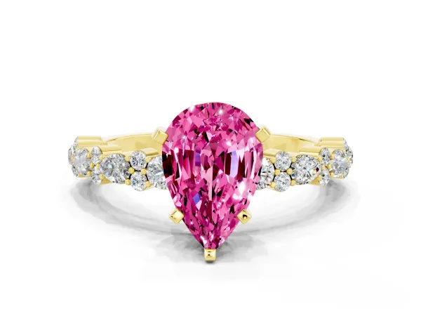 Pear Cut Pink Sapphire Side Stone Solitaire Ring with Round and Four-Prong Setting Yellow gold